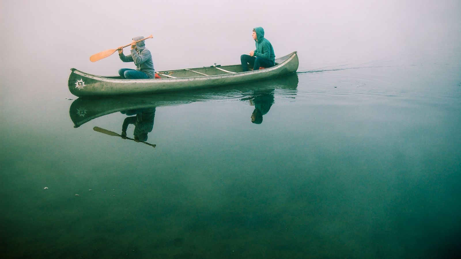 Two men in a canoe